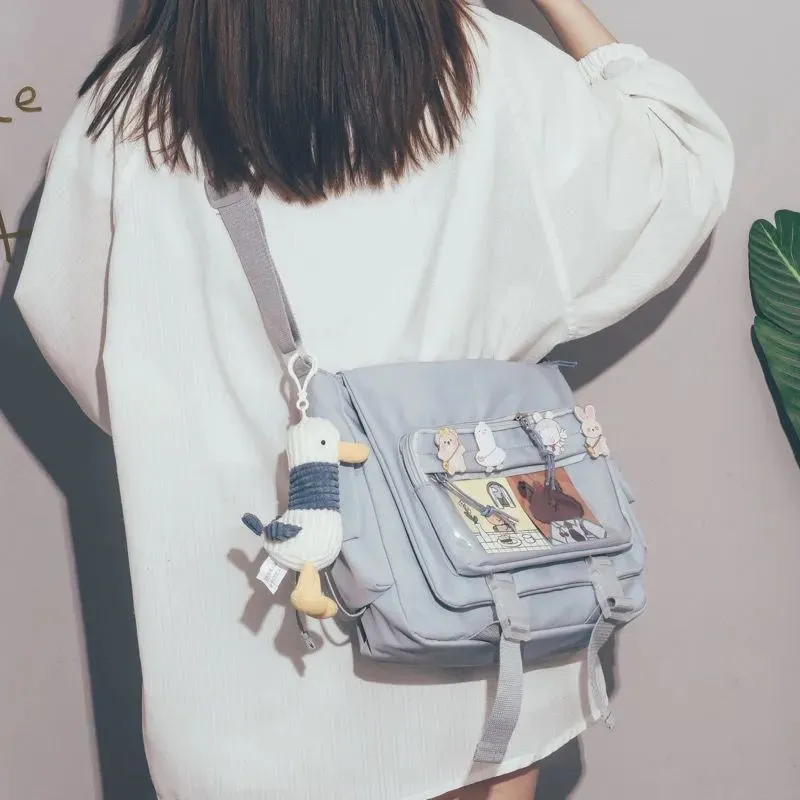 Bolso de mensajero de estilo coreano para mujer, mochila femenina de gran capacidad para la universidad, bolso de hombro versátil para estudiantes, bolsos de mano para cartero escolar